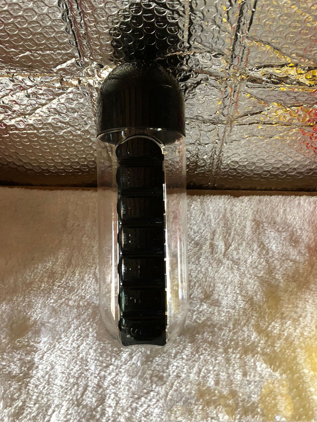 Gourde pilulier 600ml en situation d'utilisation